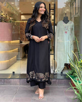 "Black Kurta Set with Embroidered Elephant Motifs – Chic Ethnic Statement"